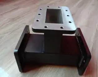 How does the size and shape of an H-Plane Tee affect its performance?